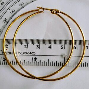 Tubular earring or hoop in yellow steel, five cm